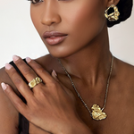 Load image into Gallery viewer, Model wearing Adanna unique gold jewellery collection by Reign and Water. Neutral background