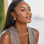 Load image into Gallery viewer, side  270 degrees profile of woman wearing adanna unique gold earrings
